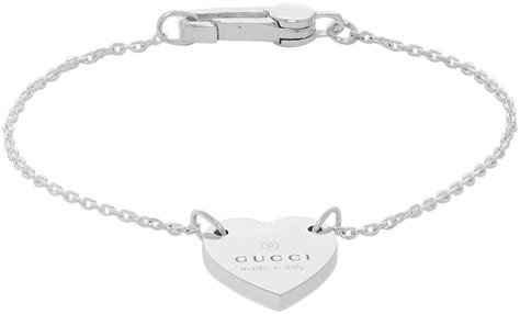 gucci silver bracelet with heart|heart bracelet with Gucci trademark.